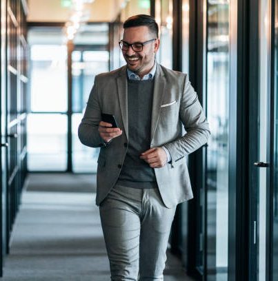 Business Man in rush QR code being used